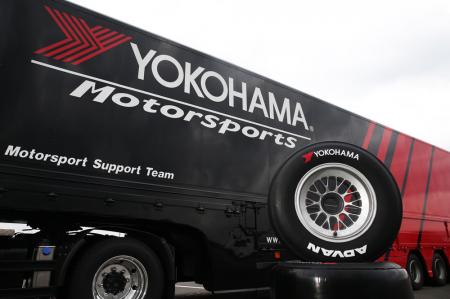 “ADVAN” racing tire on a Super Formula racing car and Racing tire service trailer 