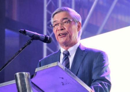 Tadanobu Nagumo, Chairman and Representative Member of the Board of Yokohama Rubber, greeting attendees to the 20th anniversary ceremony