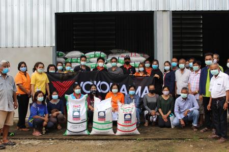 Natural rubber farmers and Yokohama Rubber Group staff at the seminar event