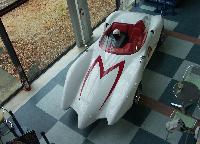 The Mach 5 is displayed in a way that allows visitors to appreciate it close-up.