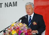 Yasuo Tominaga, chairman and representative director of the board for Yokohama Rubber, delivers his opening remarks 