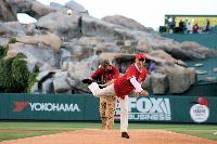 President Oishi throws the first pitch 