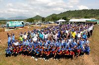 Participants in first-phase tree planting at Tire Test Center of Asia