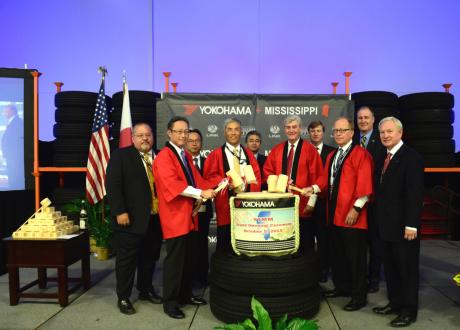 At the opening of Yokohama Tire Manufacturing Mississippi (YTMM) in West Point, Mississippi on Oct. 5, a traditional Kagami Biraki ceremony was held. Participants were (front row, L-R): Mr. Tadaharu Yamamoto, president of YTMM; Mr. Hikomitsu Noji, president and representative director of The Yokohama Rubber Co., Ltd.; Mr. Phil Bryant, governor of Mississippi; Mr. Robbie Robinson, Mayor of West Point; Mr. Glenn McCullough, executive director of the Mississippi Development Authority (MDA); (back row, L-R): Mr. Joe Max Higgins, CEO of the Golden Triangle Development Link; Mr. Takaharu Fushimi, CEO of Yokohama Corporation of North America & Yokohama Tire Corporation; Mr. Masami Kinefuchi, consul-general of Japan in Nashville; Mr. Tate Reeves, lieutenant governor of Mississippi; and Mr. Trent Kelly, U.S. congressman.