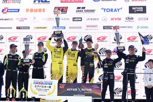 Teams running on Yokohama tires monopolize the GT300 class winners podium. Winners Harry King (center), Kiyoto Fujinami (center left), and Tsubasa Kondo (center right), with 2nd place drivers Zak O'Sullivan (3rd from left), Rikuto Kobayashi (2nd from left), and Keita Sawa (far left) and 3rd place drivers Takashi Kogure (far right) and Yuya Motojima (2nd from right)