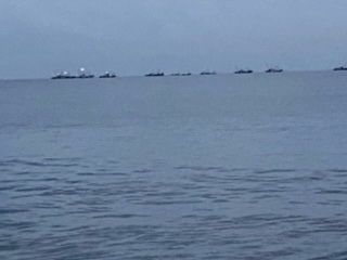 夜明けの海でのヒトコマ